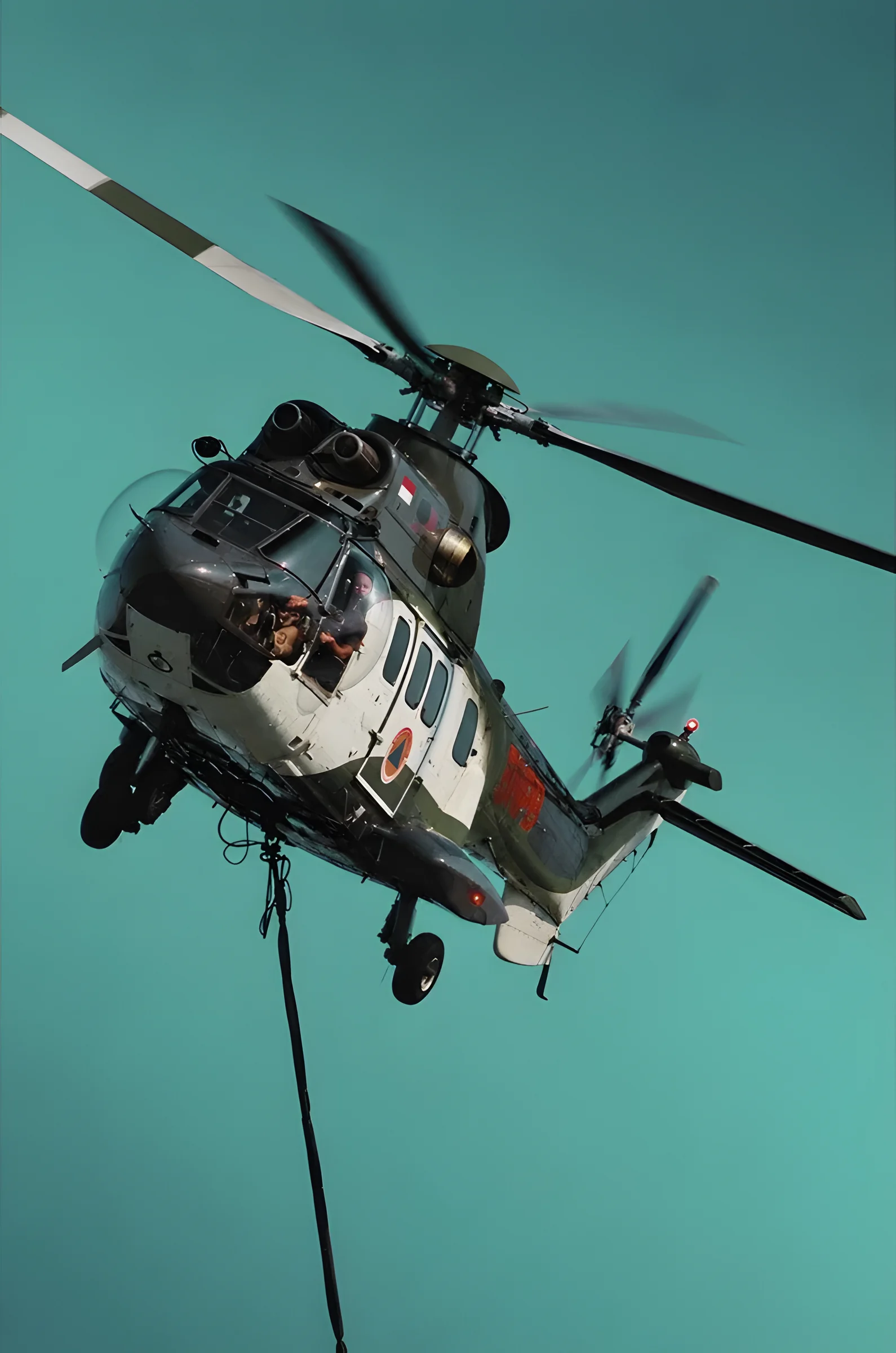 Sikorsky S-70 Black Hawk in flight with an external load