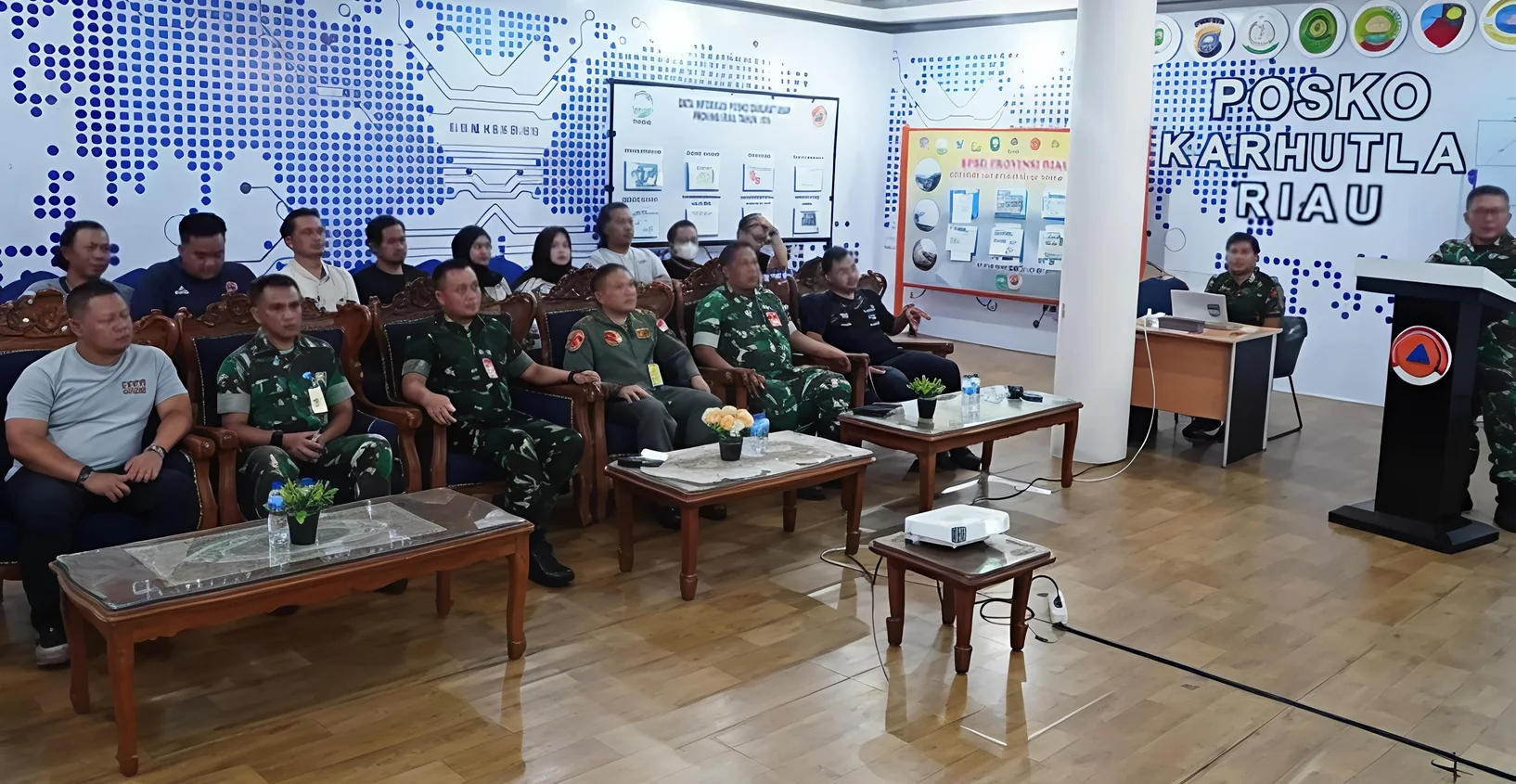 Briefing at the wildfire command post in Riau